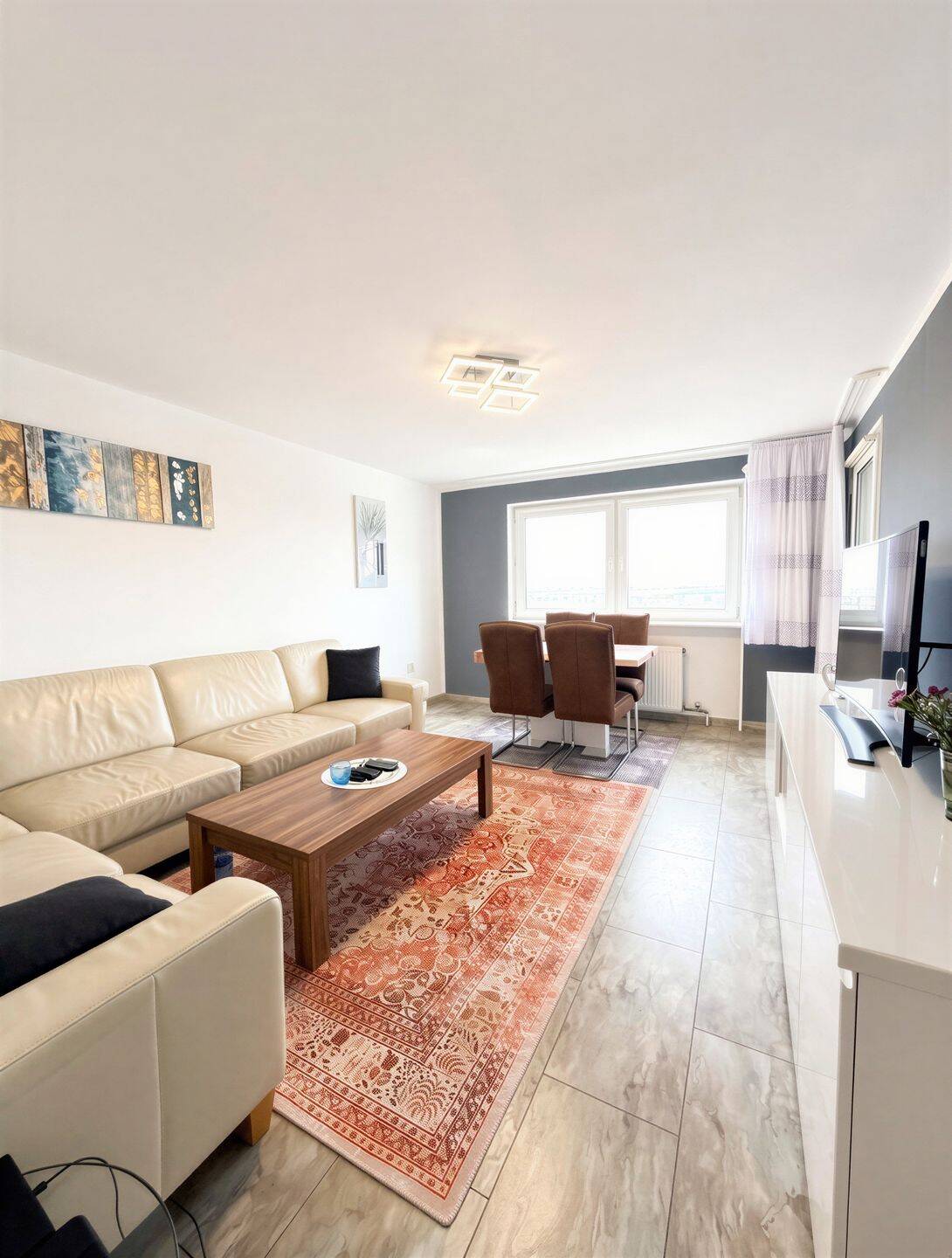 KENSIONGTON - Licht. Weite. Skyline. - Moderne 2-Zimmer-Wohnung mit sonniger Loggia nahe BMW