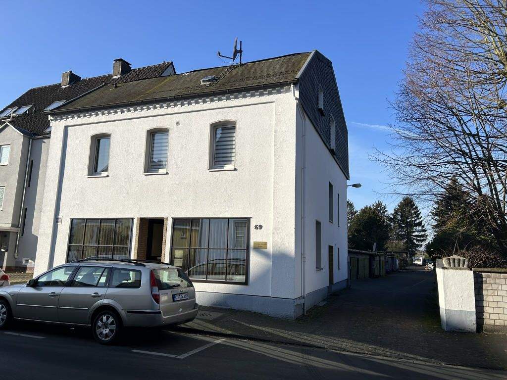 Kleines Mehrfamilienhaus mit Büroeinheit auf großem Grundstück! – Leverkusen – Bild 1 von 5