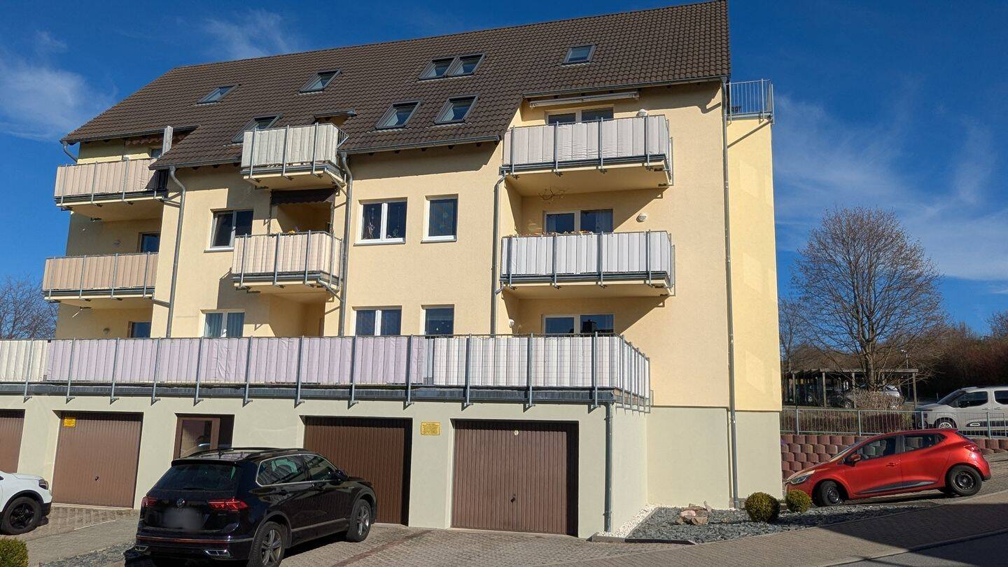 Charmante Maisonette-Eigentumswohnung mit Balkon, Garage und Stellplätzen