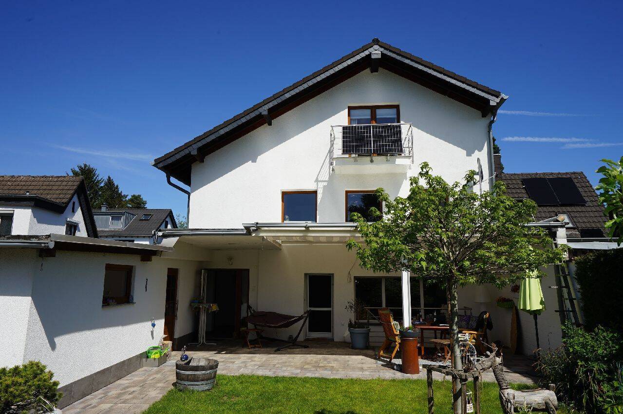 Großzügige Doppelhaushälfte mit Anbau und Garage auf Westgrundstück in Leverkusen-Schlebusch