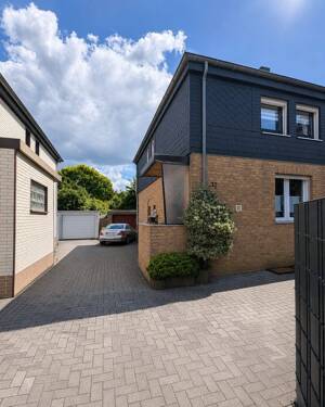 Gemütliches Reihenendhaus mit großem Garten, Terrasse, Garage und viel Nutzfläche