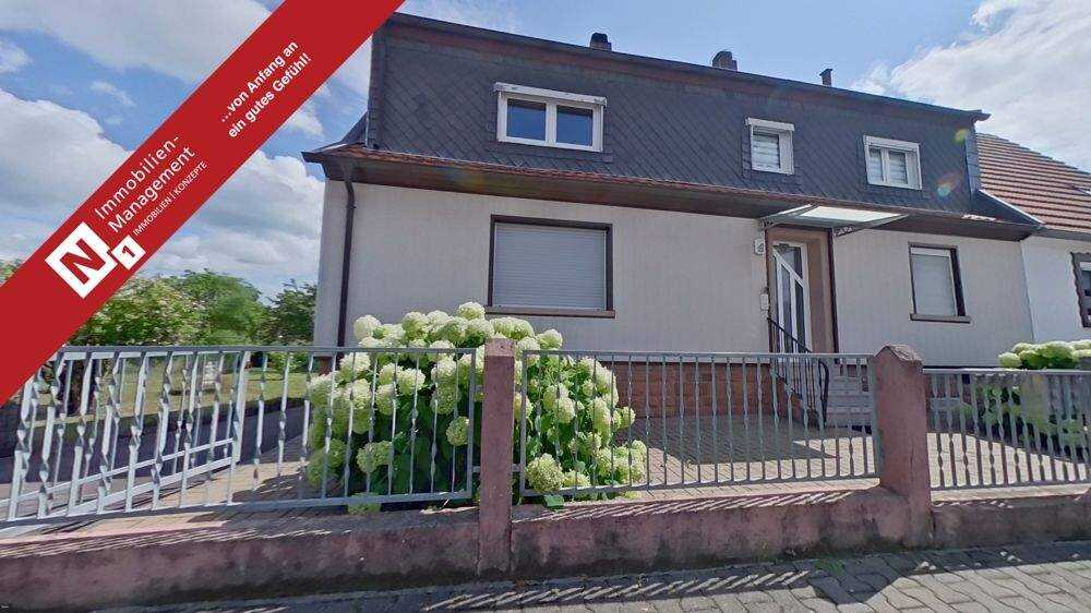 Eine Vielzahl an Nutzungsmöglichkeiten - 1-2-Familienhaus mit Baugrundstück in zweiter Reihe – Enkenbach-Alsenborn – Bild 1 von 9