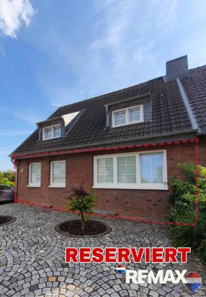Gartenidylle in Krefeld-Hüls - Modernisierte Erdgeschosswohnung mit Wintergarten zu verkaufen!