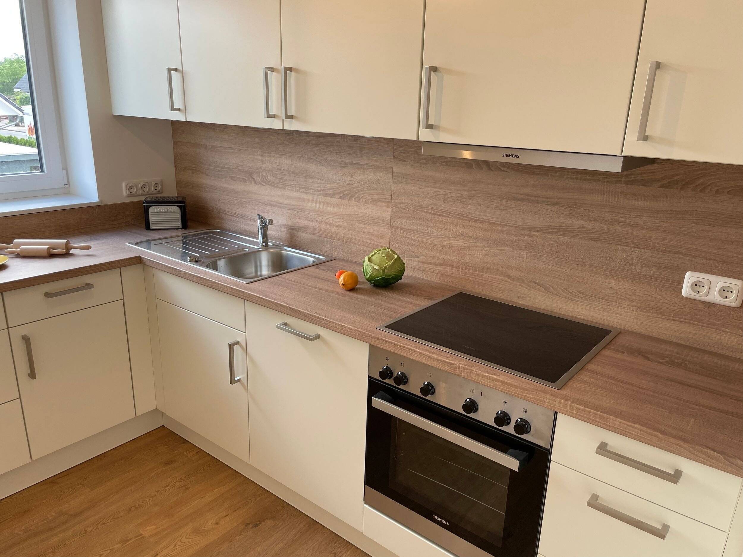 Großzügige 3 Zimmer Wohnung im Neubau mit Fahrstuhl und großem Balkon