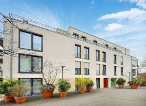 Vermietete 4-Zimmer-Wohnung in zentraler Lage mit Balkon und zwei Tiefgaragenstellplätzen
