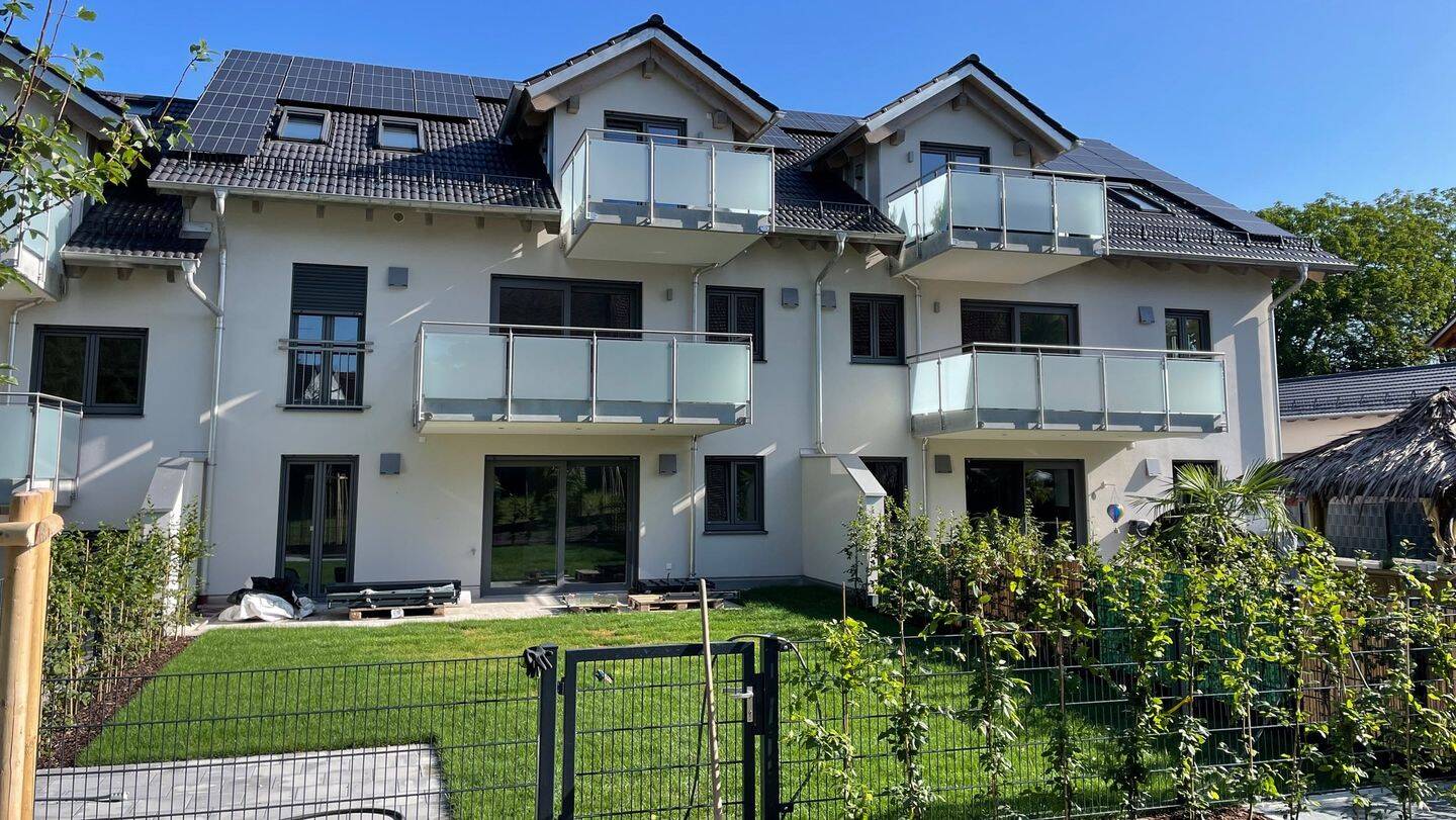 Schöne 3-Zimmer-Gartenwohnung mit 92 m² Wohnfläche, großem Südgarten & 2 TG-Stellplätzen