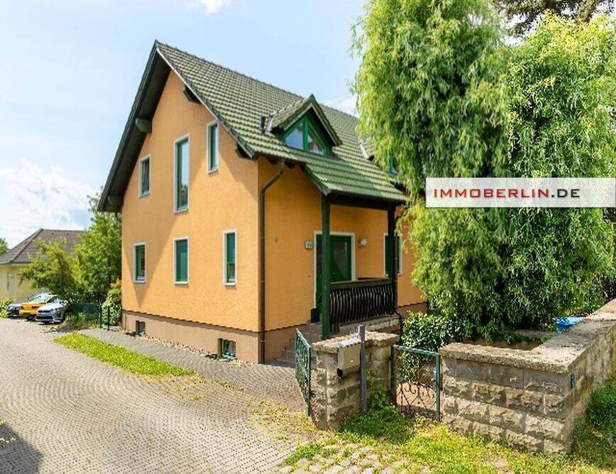 IMMOBERLIN.DE - Sehr gepflegtes Einfamilienhaus mit schönem Südgarten – Hoppegarten – Bild 1 von 9
