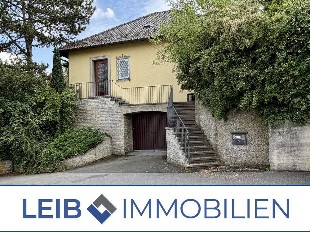Großzügige Souterrain Wohnung mit Garage und Garten