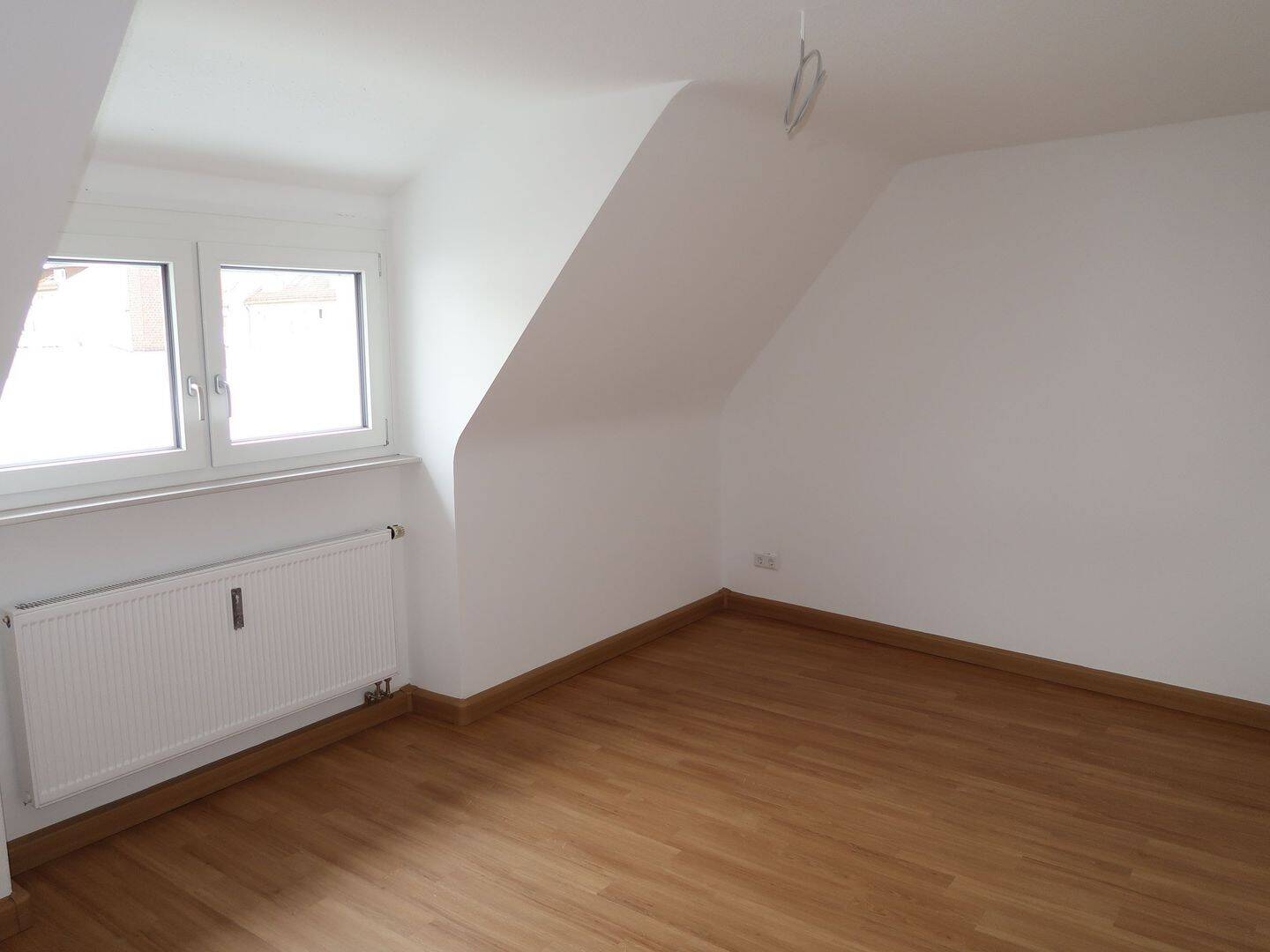 Wohnen im Rückgebäude: 2-Zimmer-Dachgeschoßwohnung