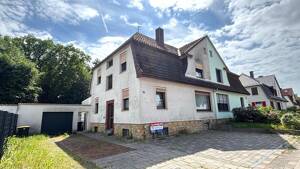 Doppelhaushälfte mit 2 Wohneinheiten und Garagen in Osnabrück-Eversburg