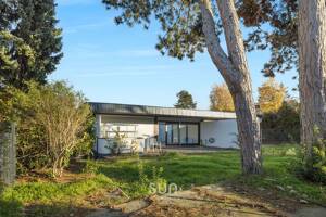 Attraktives Einfamilienhaus mit 4 Wohneinheiten, 110 m² Garten und großzügiger Terrasse