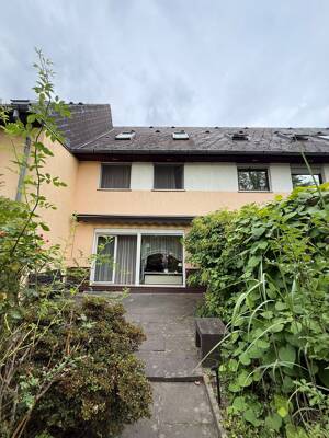 Charmantes kleines Reihenhaus mit Garten zum Renovieren