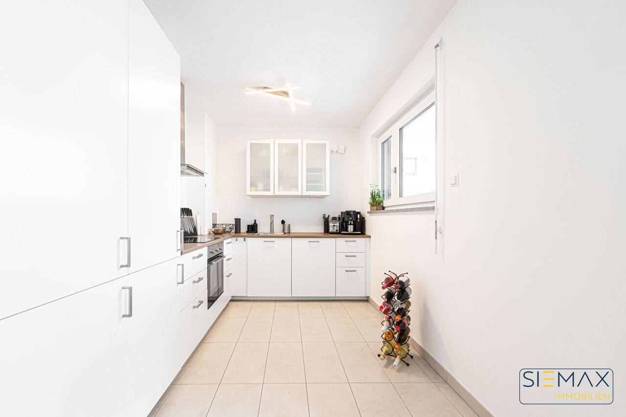 Bezugsfrei: Moderne Wohnung mit Einbauküche und überdachtem Balkon in ruhiger Lage – München – Vorschaubild 5