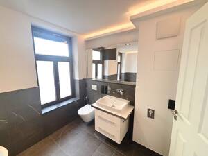 Genial! + Erstbezug mit Balkon + Parkett + Fußbodenheizung + Wanne & Dusche + LED-Licht – 4177 Leipzig – Vorschaubild 7