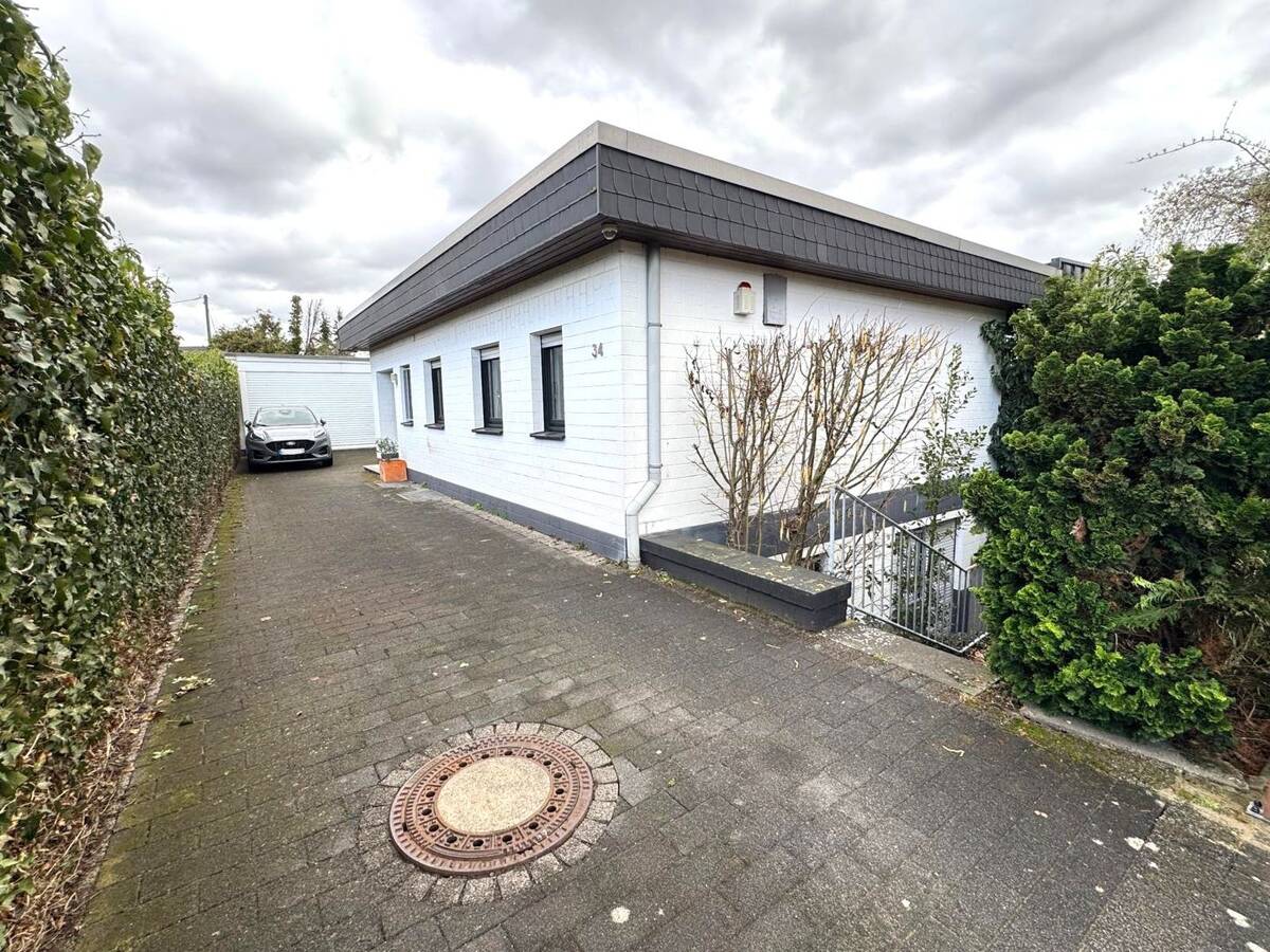 Charmantes, großzügiges Familienhaus mit Garten in Köln-Esch – 50765 Köln – Bild 1 von 9