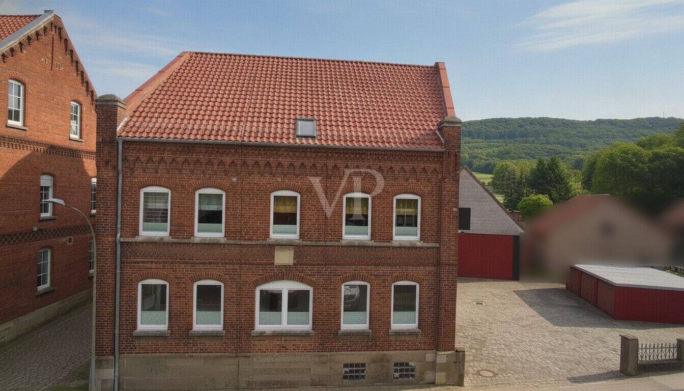 Vielseitiges Mehrfamilienhaus mit drei Wohnungen, Nebengebäuden und Entwicklung auf großem Areal – Coppenbrügge – Vorschaubild 4