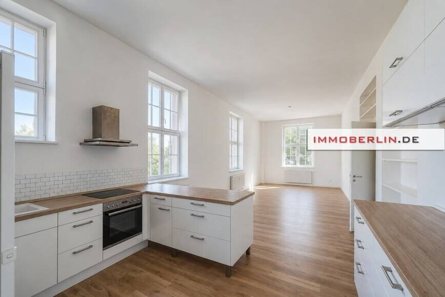 IMMOBERLIN.DE - Helle Altbauwohnung mit Balkon & Pkw-Stellplatz in harmonischer Lage