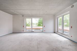 AIGNER - Neubau: Lichterfülltes Familiendomizil mit Dachterrasse im Münchner Nordwesten