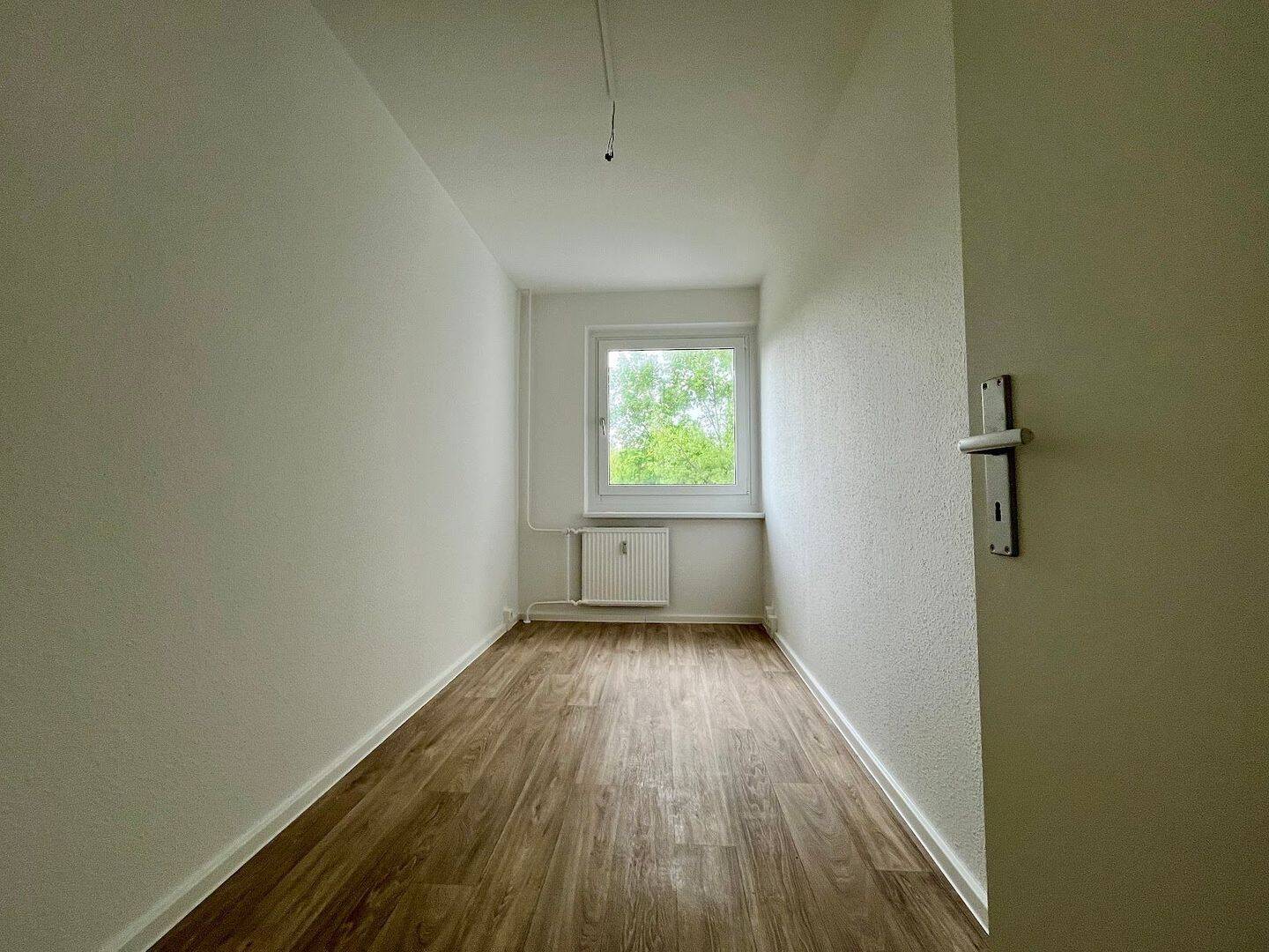 Ruhige Etagenwohnung mit Balkon, ideal für Familien und kurze Wege zu Schulen