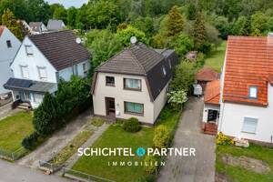 Huchting | Freistehendes Zweifamilienhaus mit großem Grundstück – 28259 Bremen – Vorschaubild 1