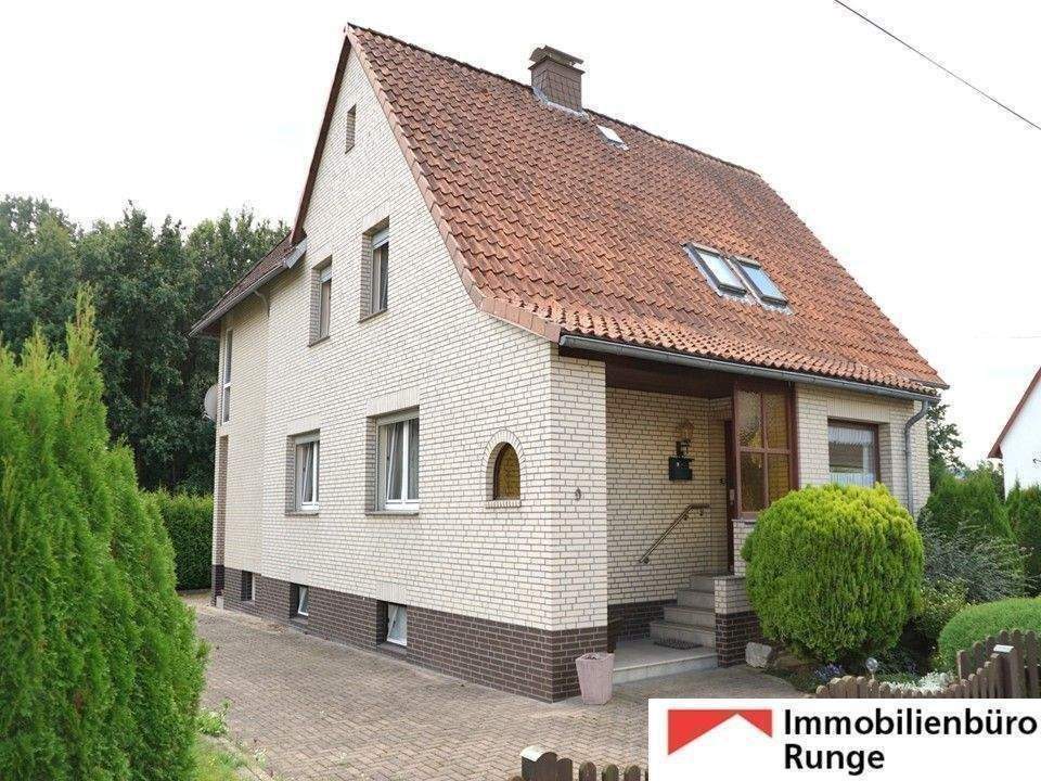 Gepflegtes Zweifamilienhaus mit großem Wintergarten in idyllischer Lage von Bad Münder-Böbber – Bad Münder am Deister – Bild 1 von 9