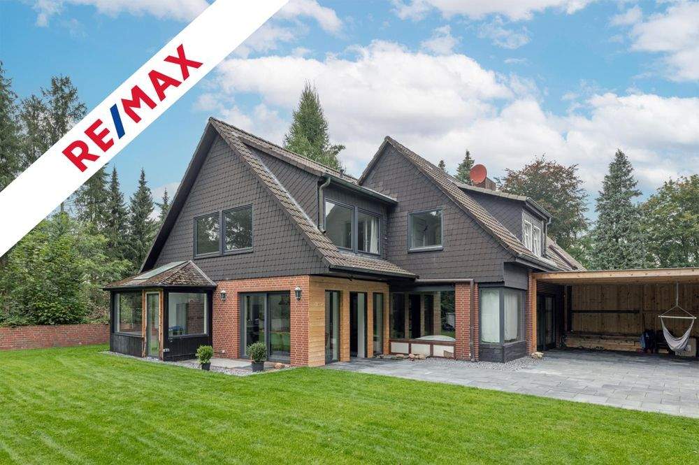 Zwei Doppelhaushälften für die ganz große Familie oder eine Hälfte renovieren und vermieten! – Buchholz in der Nordheide – Bild 1 von 9