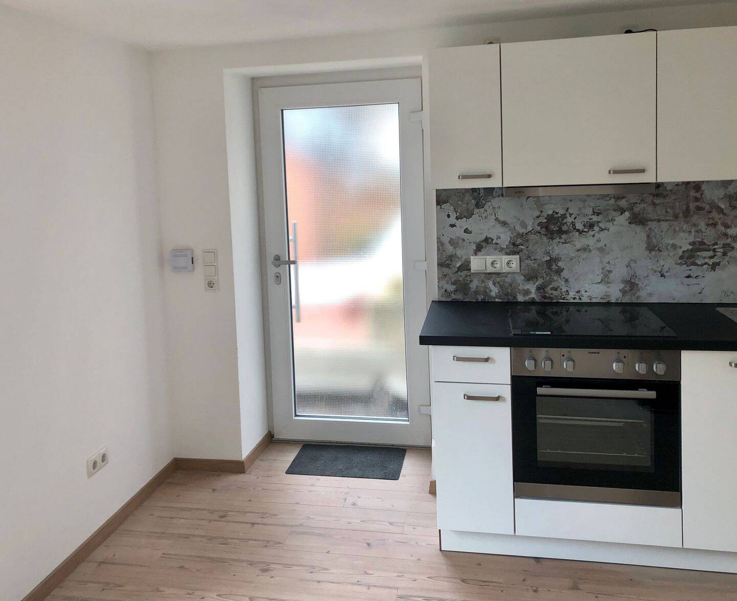 Hochwertige Einliegerwohnung mit schöner Terrasse in ruhiger Lage