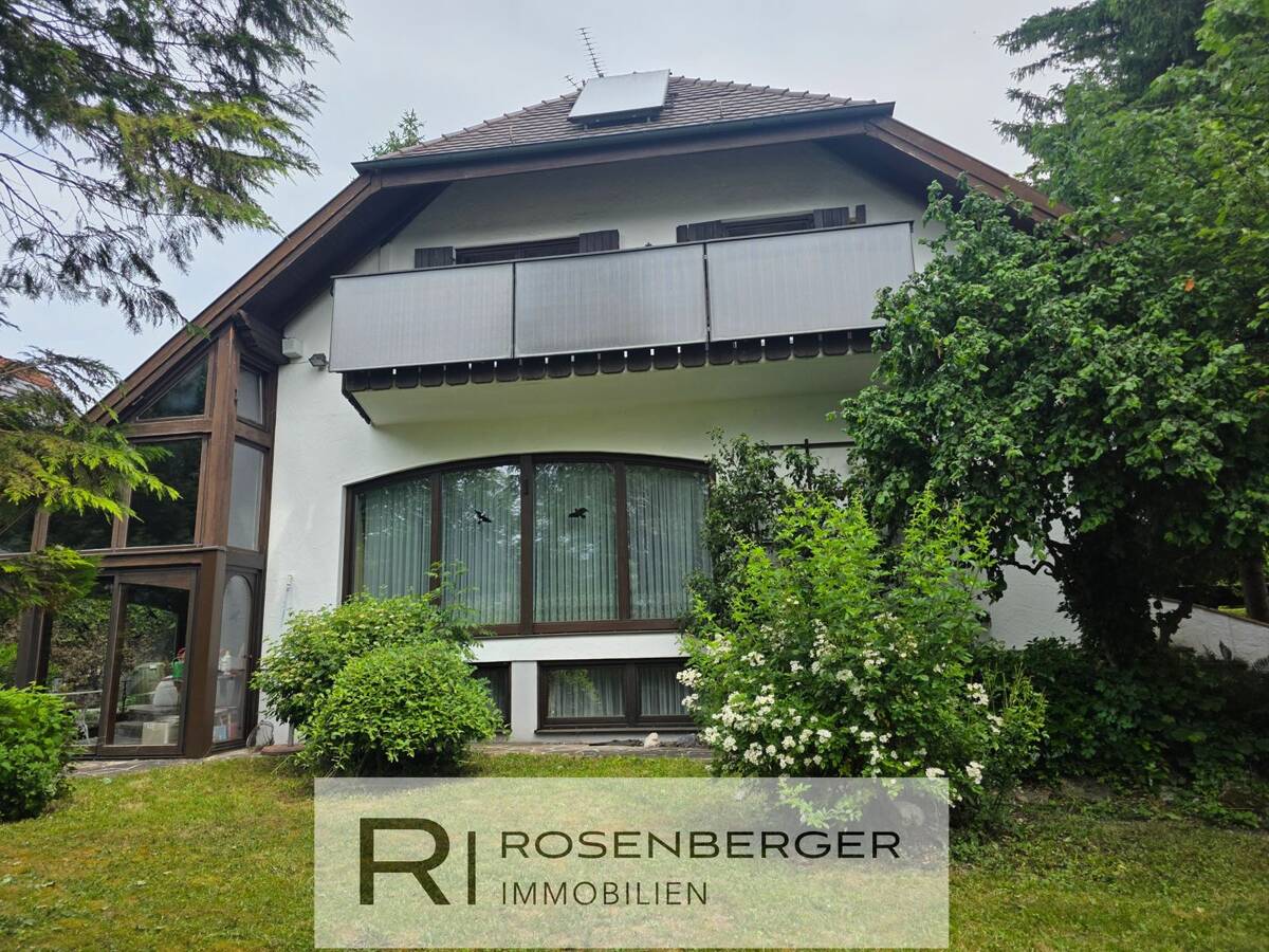 Außergewöhnliches Einfamilienhaus mit Einliegerwohnung, Wellnessbereich und traumhaftem Garten – 81249 München – Bild 1 von 9