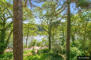 Ein Sprung vom eigenen Garten in den See: Historische Villa in einzigartiger Schlachtenseelage