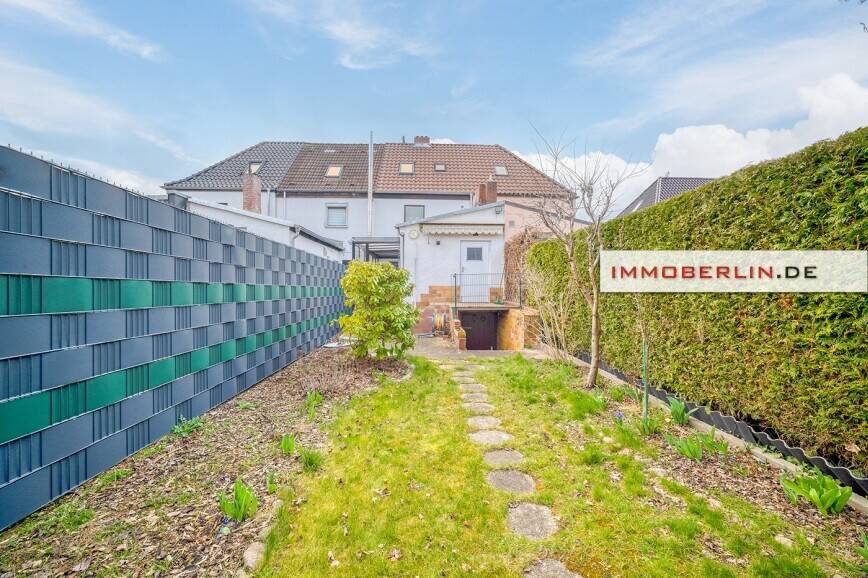 IMMOBERLIN.DE - Gepflegtes Reihenhaus mit beschaulichem Garten in Ruhelage