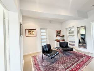 Beautifully Modernized Home with Landscaped Garden and Solar Power System