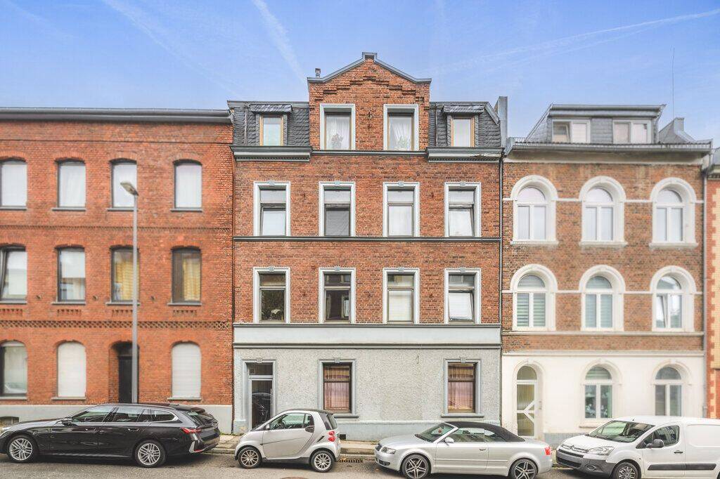 Attraktives Mehrfamilienhaus mit 4 Wohneinheiten, Garage und Lagerhalle in Aachen-Haaren