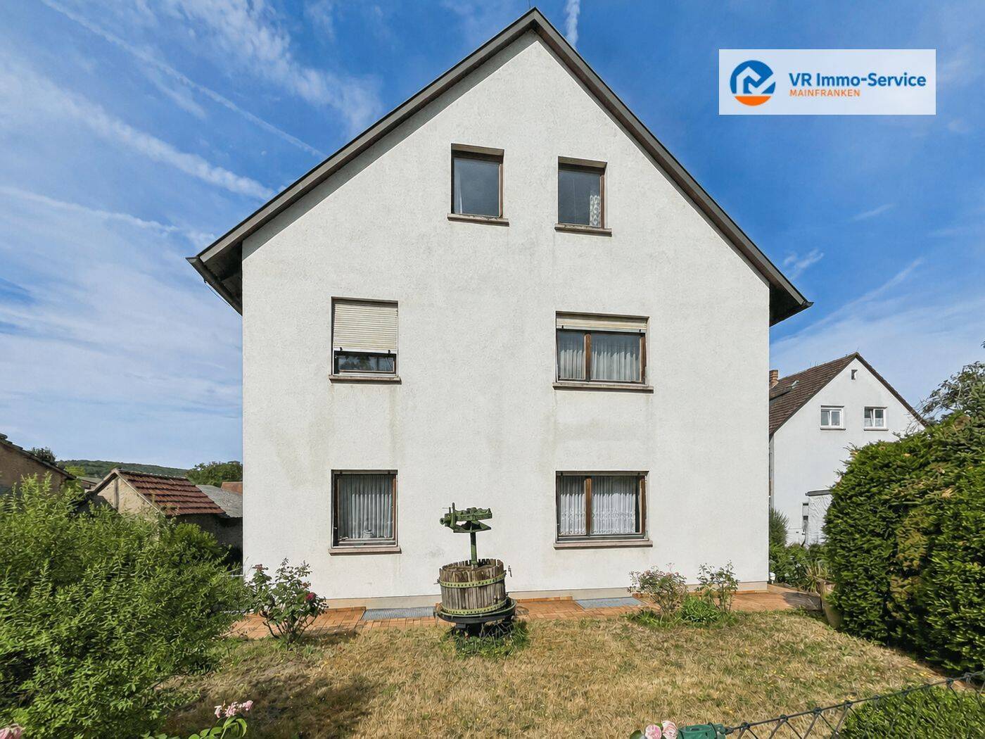 Viel Platz, großes Grundstück und Ausbaupotenzial - Zweifamilienhaus in Veitshöchheim