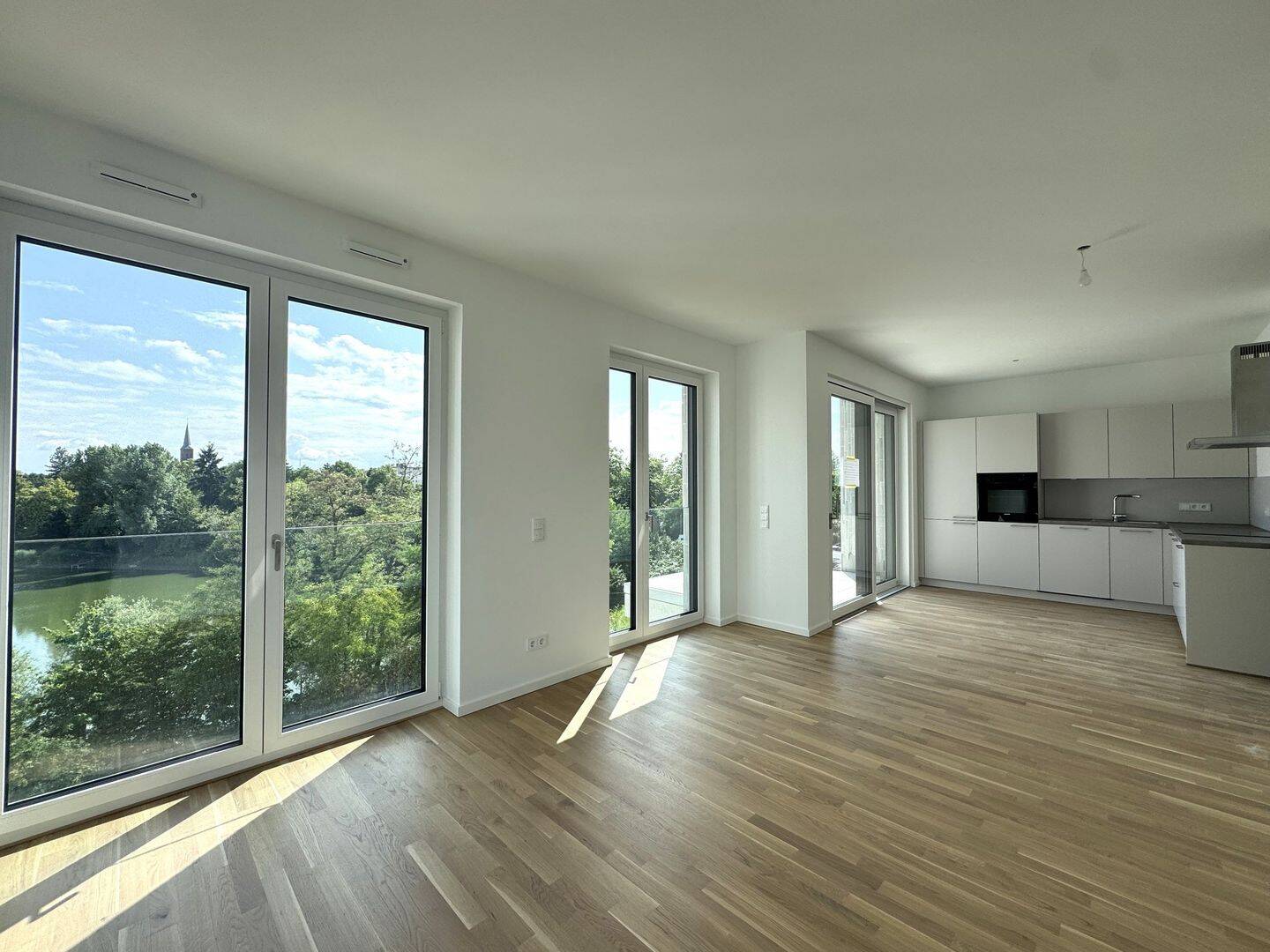 PANDION ALBERTUSSEE - Hochwertige 3-Zimmer-Wohnung in erster Reihe
