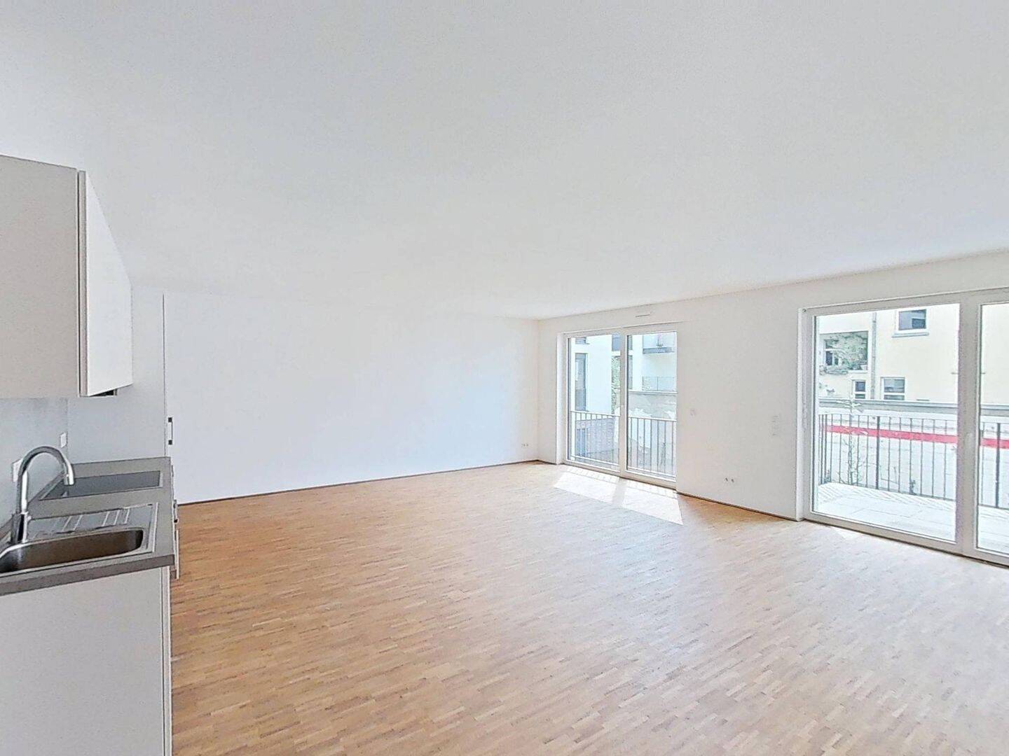 Geräumige 3-Zimmer-Neubauwohnung mit Balkon und Einbauküche im Wohnquartier 'Großherzog Friedrich Höfe'