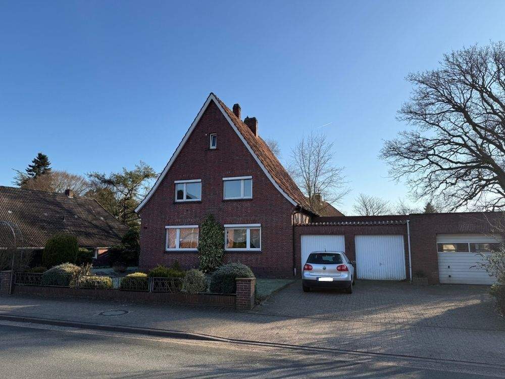 Zweifamilienhaus mit Doppelgarage und großer Werkstatt – Varel – Bild 1 von 9