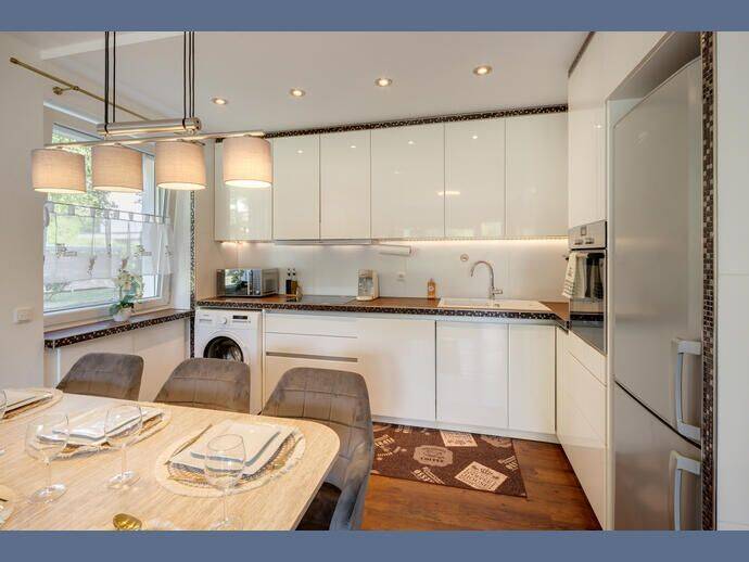 Möbliert: Balkonwohnung mit Blick in den Gemeinschaftsgarten – München – Vorschaubild 7