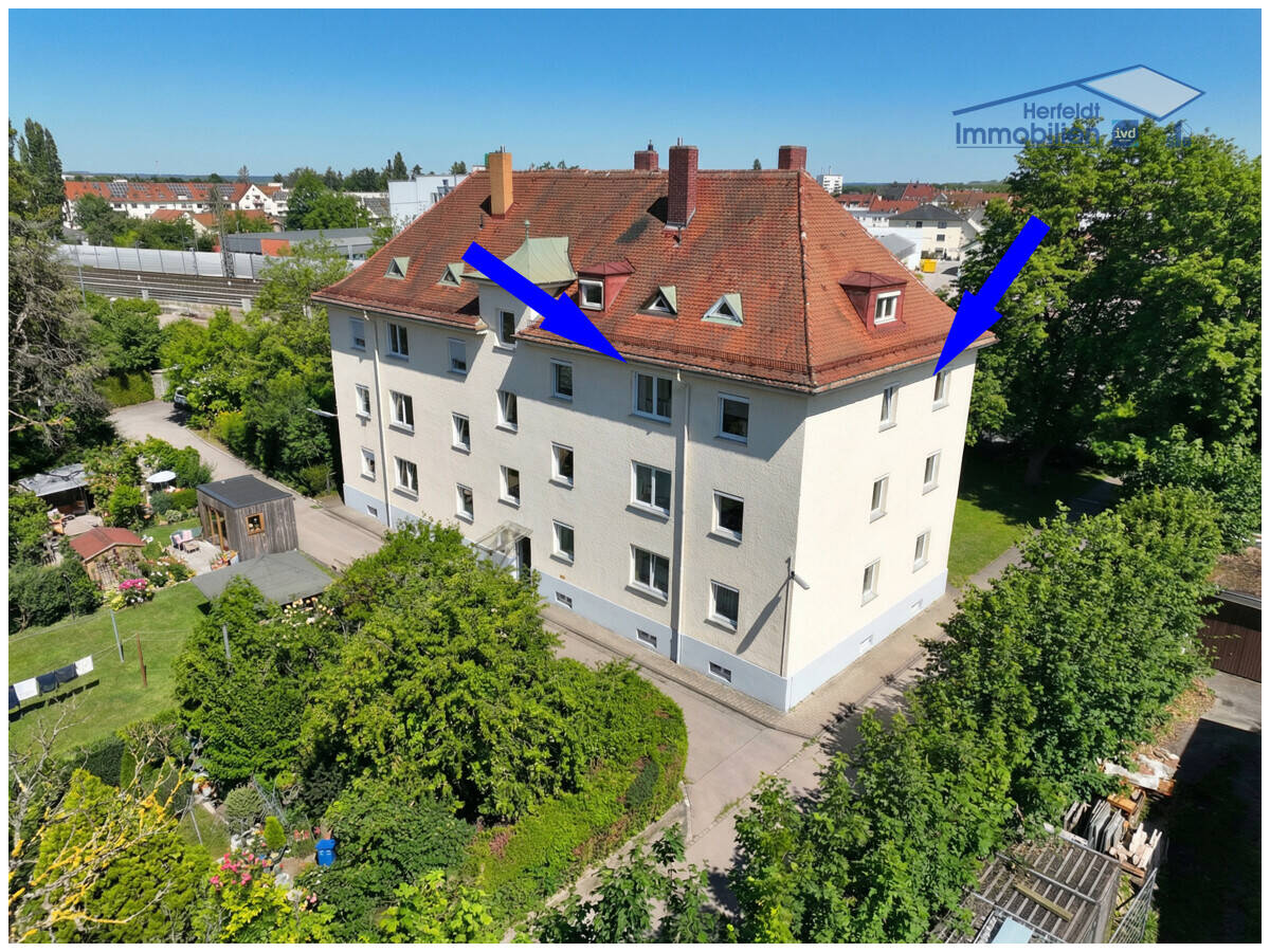 5% Rendite! Liebevoll renovierte 3-Zimmer-Wohnung mit großem Gemeinschaftsgarten & zwei Stellplätzen