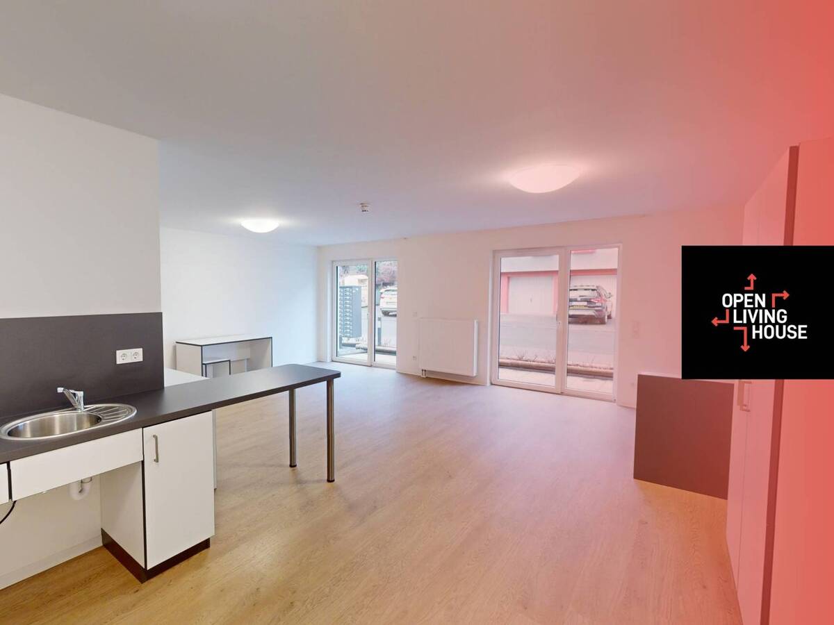 **STUDENTS ONLY** Rollstuhlgerechtes Apartment MÖBLIERT mit TERRASSE im Open Living House Siegen (nur für Studierende!) – 57074 Siegen – Bild 1 von 9