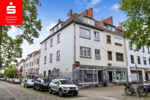 Bremen-Viertel: Mehrfamilienhaus mit 6 Wohneinheiten, kleiner Ladenfläche und 2 Garagen