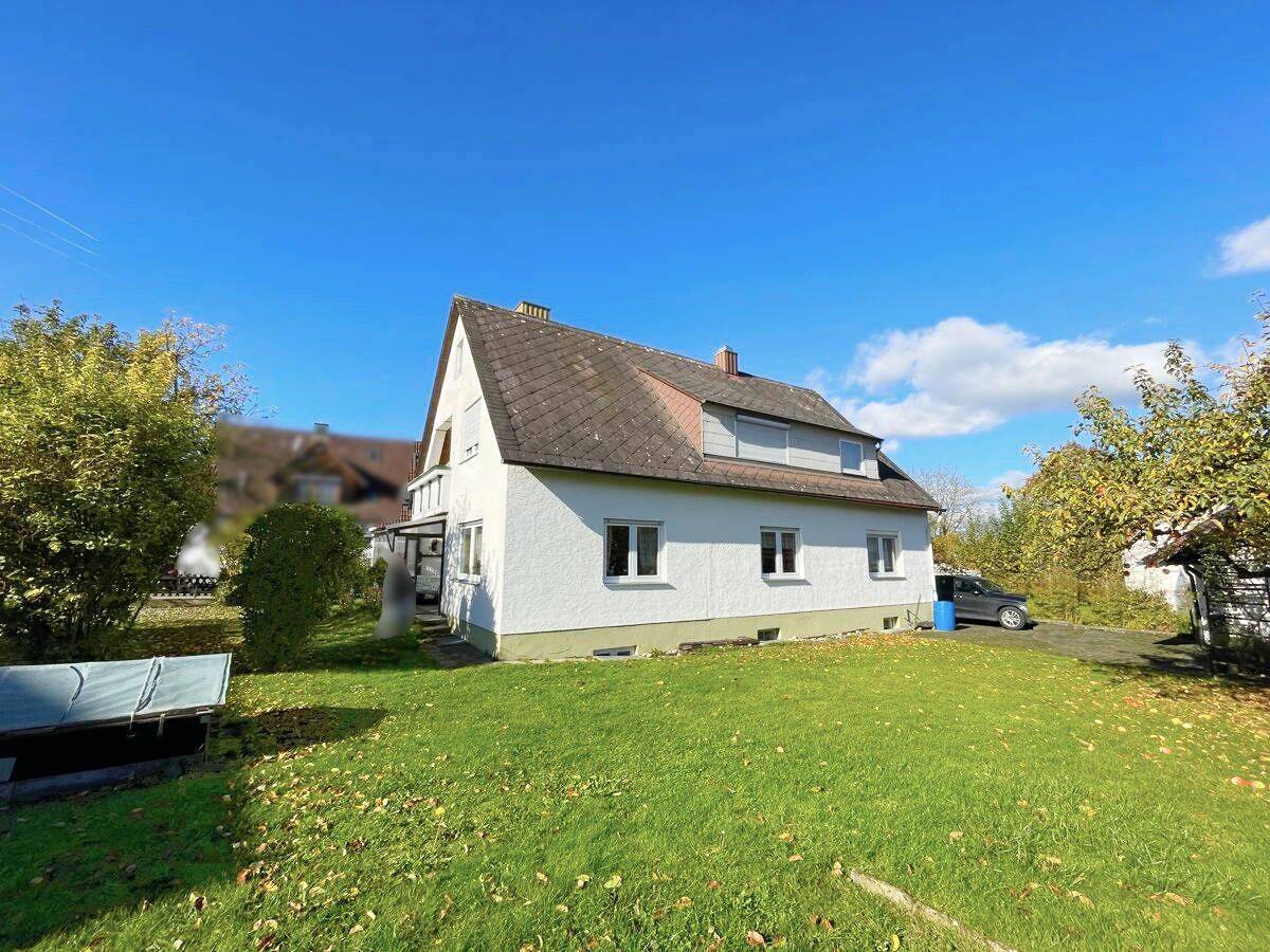 Ein- bis Zweifamilienhaus mit Garage und Werkstatt in Neu-Ulm/Reutti – 89233 Neu-Ulm – Bild 1 von 9
