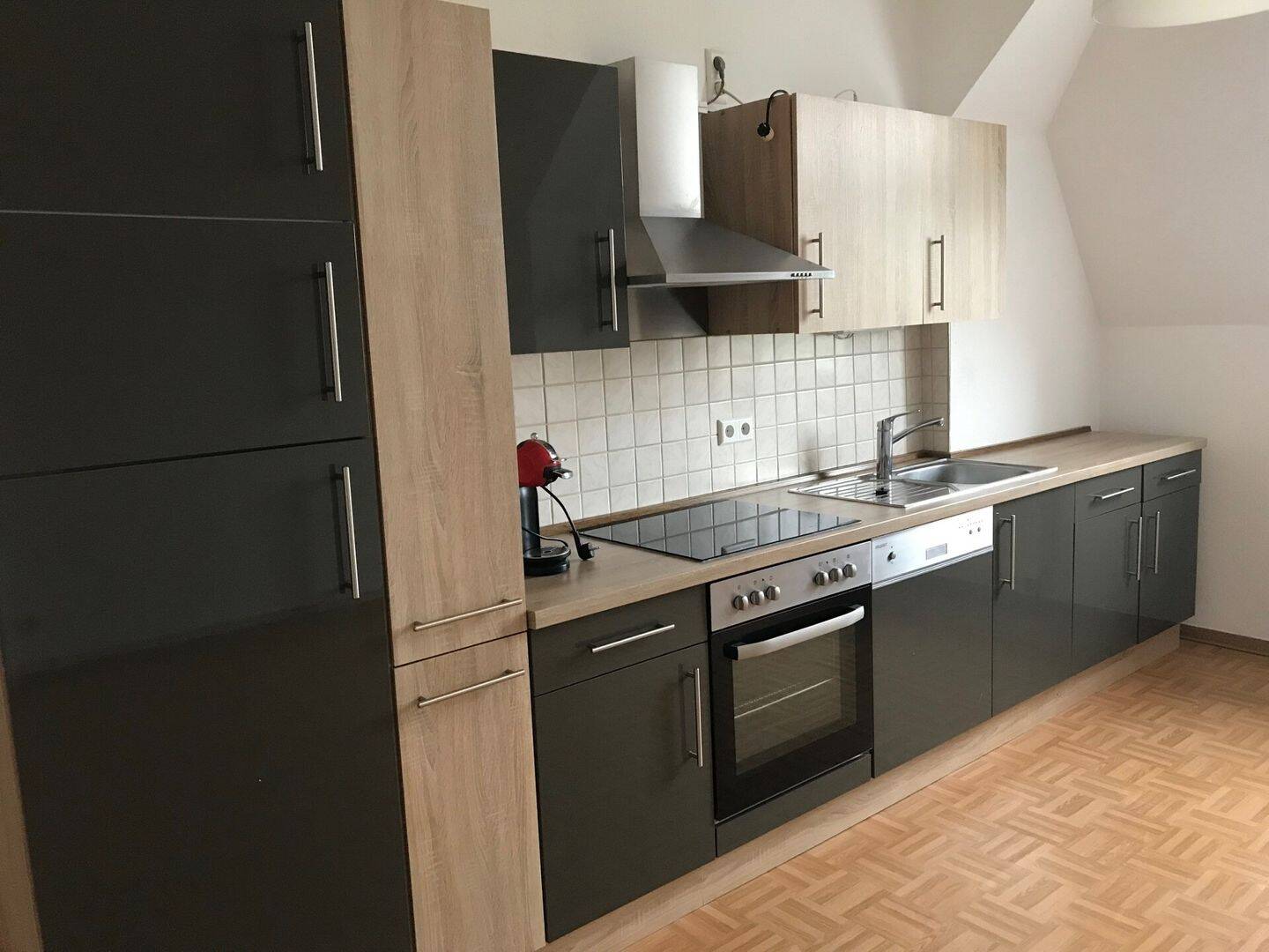Dachgeschosswohnung mit EBK und Tageslichtbad