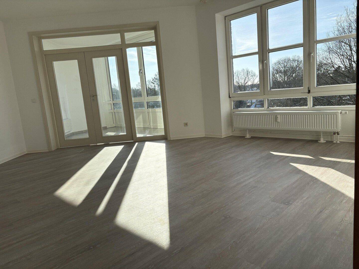 3-Zimmer Endetagen-Wohnung mit Südloggia und Tiefgaragen-Stellplatz