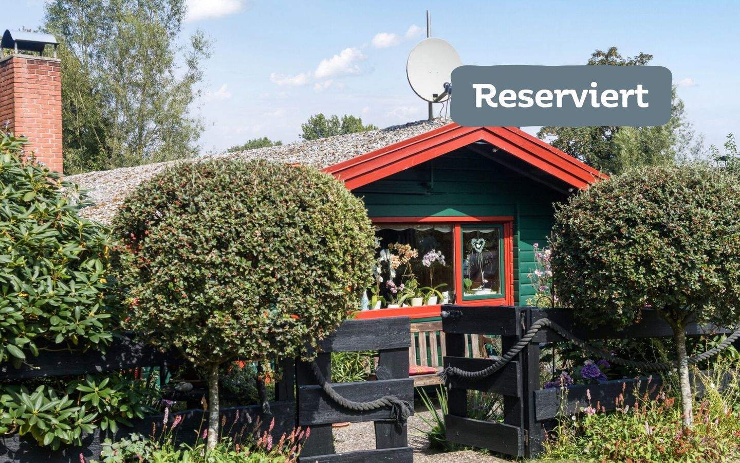Landromantik am Langsee - Gemütliches Ferien-Blockhaus in blühender Idylle – Süderfahrenstedt – Bild 1 von 9