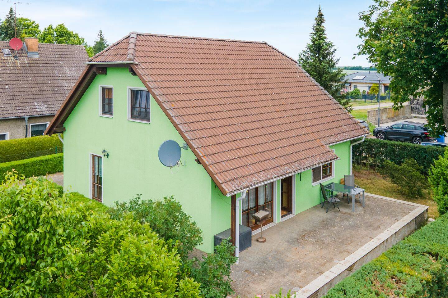 Mit Einbauküche, Fußbodenheizung, Rollläden, Garagen u.v.m.: Landhaus-Einfamilienhaus in Reichenberg – Märkische Höhe – Vorschaubild 3