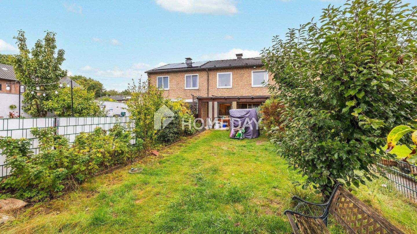 Haus in Dornröschenschlaf! Reihenhaus mit Süd-Terrasse, Garten & Platz für die Familie – Meerbusch – Bild 1 von 9