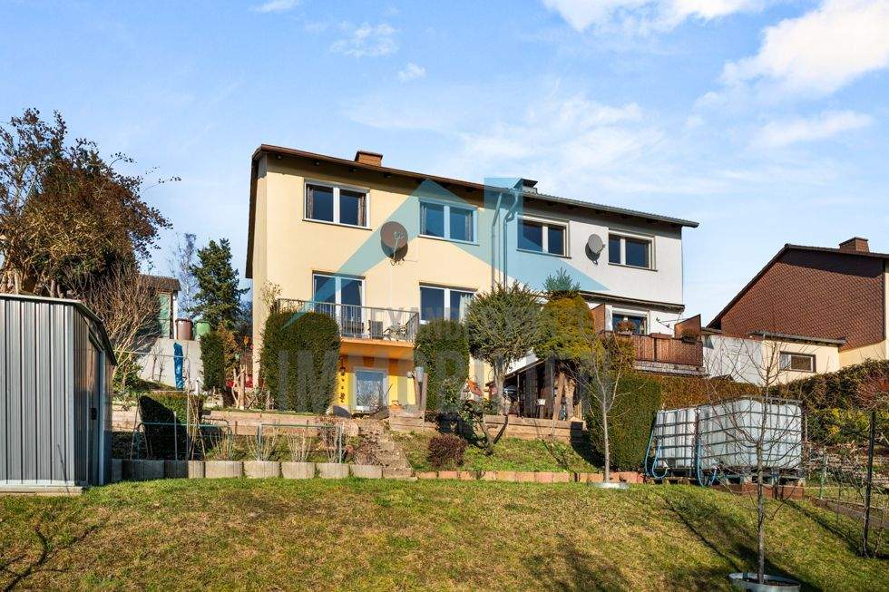 Modernisierte Doppelhaushälfte mit traumhaftem Fernblick - einziehen und wohlfühlen! – Ahnatal – Bild 1 von 9