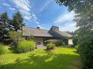 Architektonisch reizvolles Einfamilienhaus mit Galerie, Kamin und Garten in Nienberge!