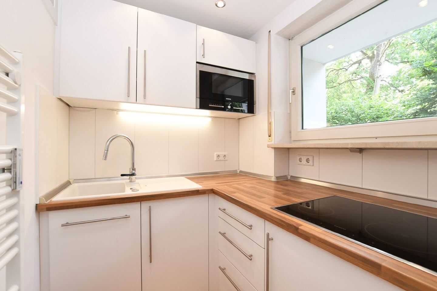 AIGNER - Stilvolle 1-Zimmer-Wohnung mit Terrasse und Tiefgaragenstellplatz in München-Solln – München – Vorschaubild 4