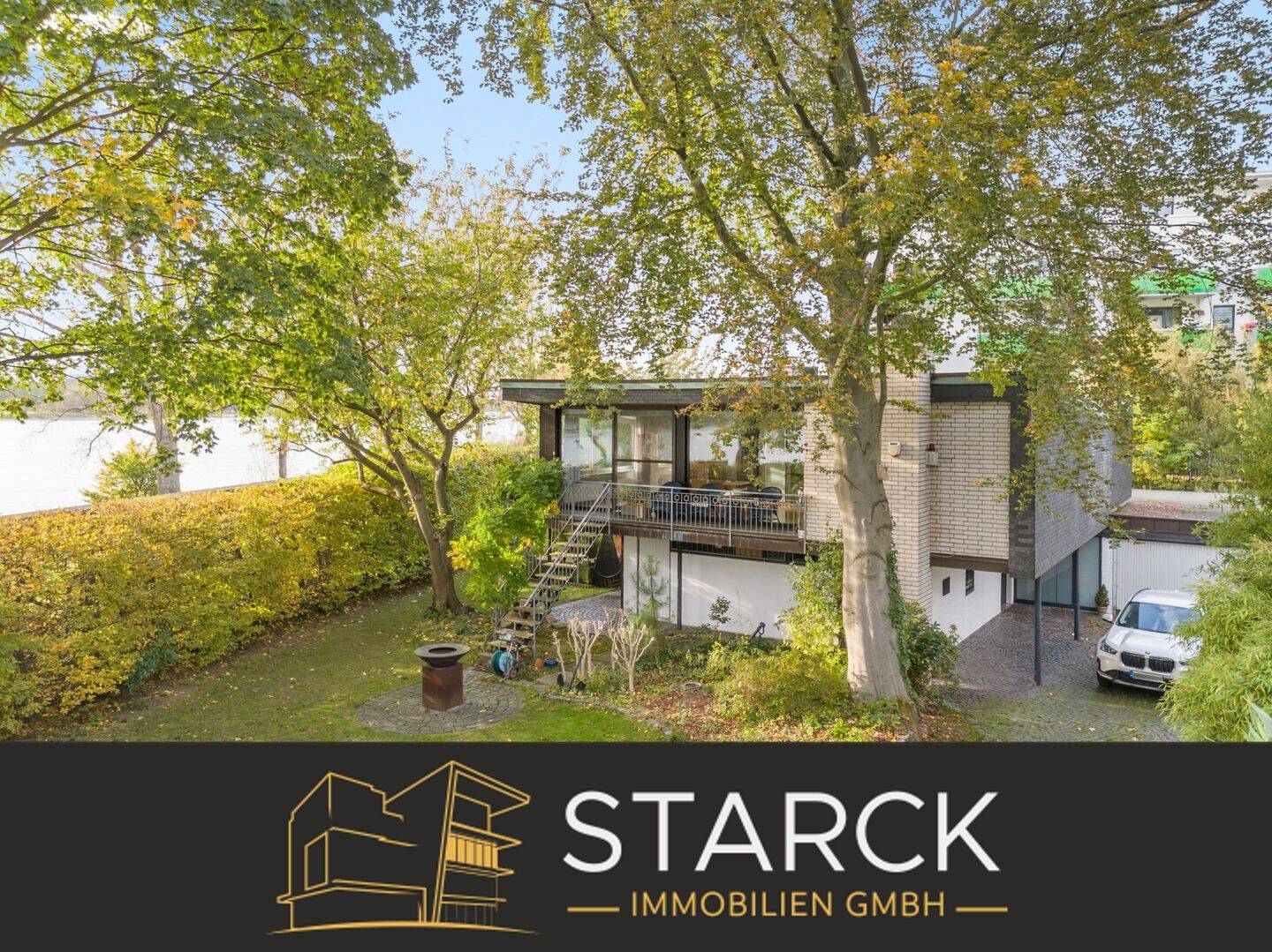 Exklusives Architektenhaus in Rheinlage mit Einliegerwohnung, Atrium und traumhaftem Blick